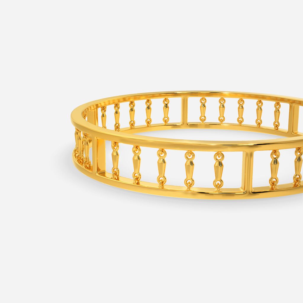 Dramatically Fringed Gold Bangles