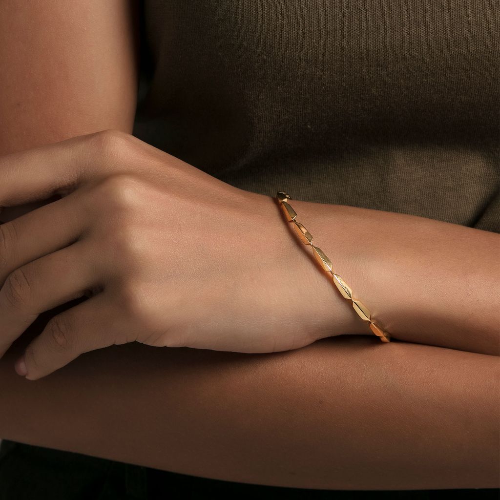 Groovy Folds Gold Bangles
