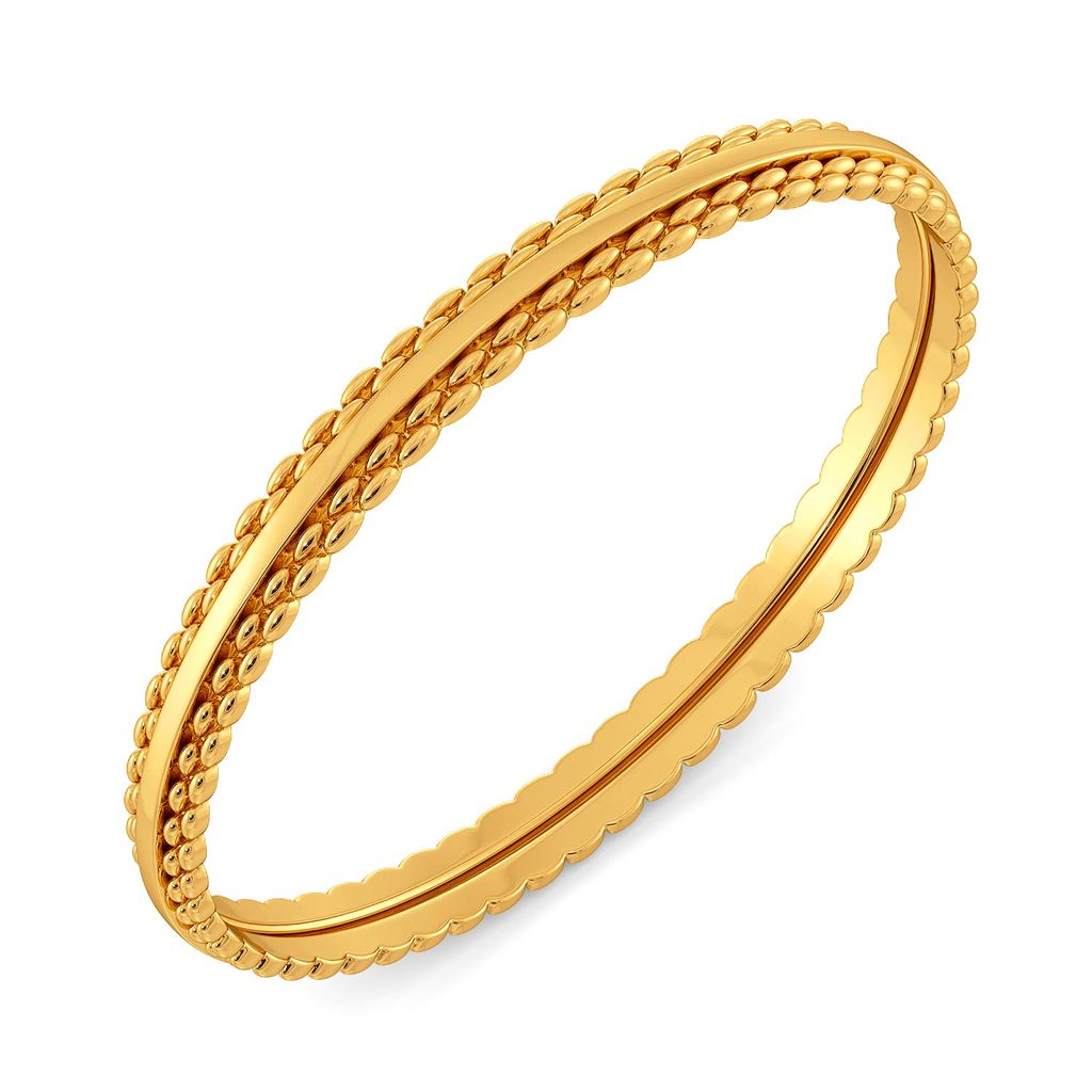 The Tweed Trove Gold Bangles