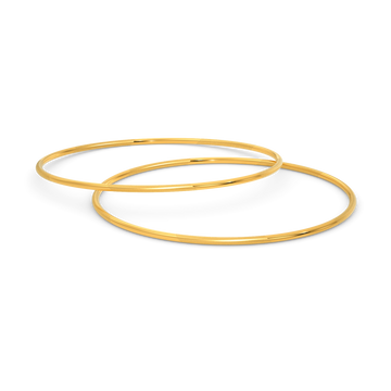 Uplifted Pair of Gold Bangles