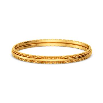 The Tweed Trove Gold Bangles